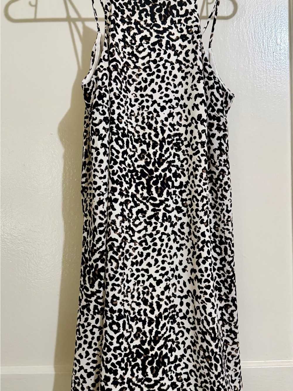 Mini leopard low back dress.